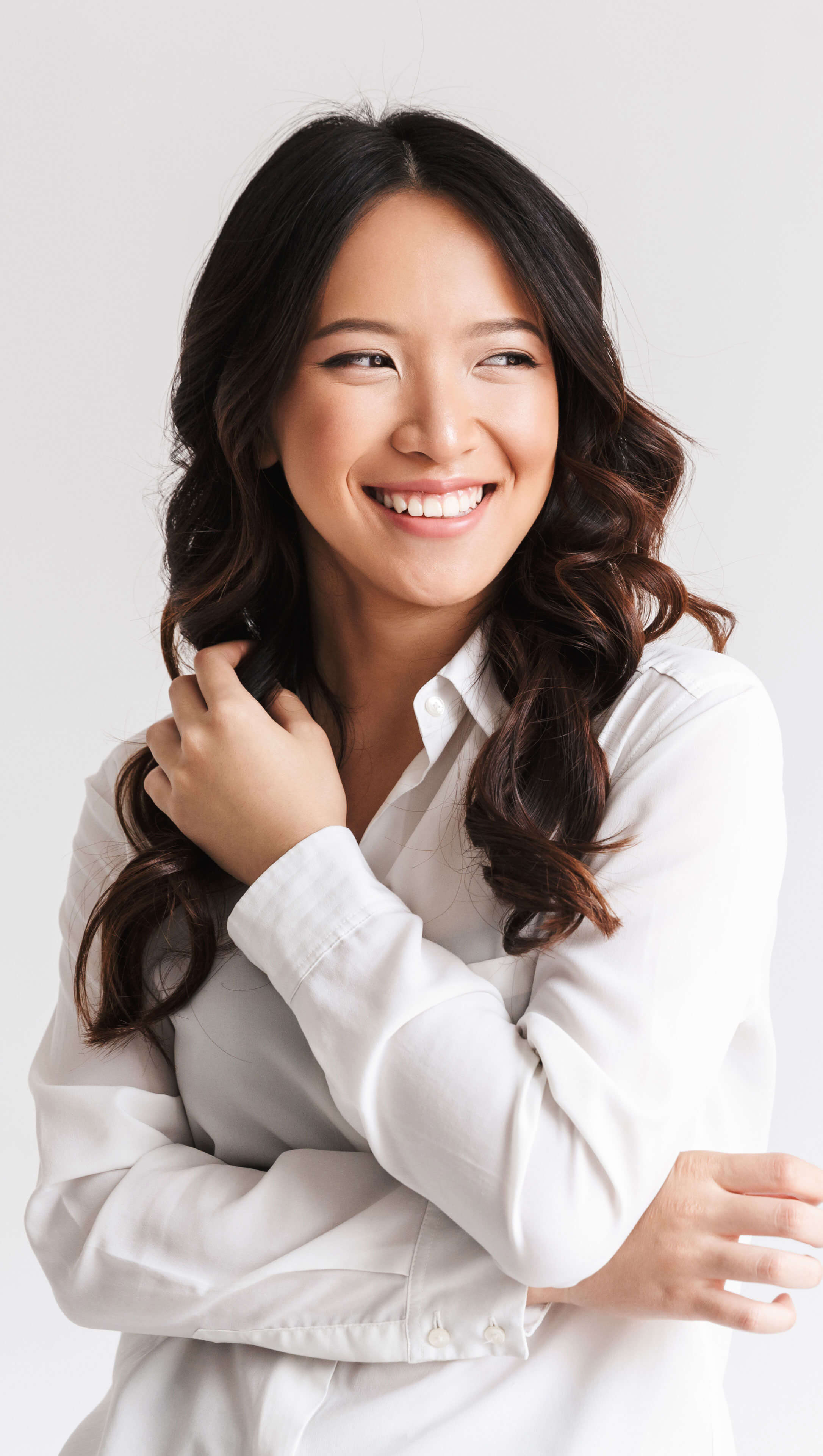 Woman with white shirt smiling